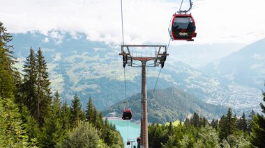 Golmerbahn-Gondelbahn am Erlebnisberg Golm im Montafon, umgeben von alpiner Berglandschaft | © Golm Silvretta Lünersee Tourismus GmbH Bregenz, Mathaeus Gartner