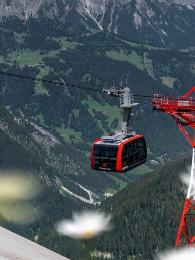 Bergbahn Gondel vom Lünersee, die gerade den Berg zum Lünersee hoch fährt | © Golm Silvretta Lünersee Tourismus GmbH Bregenz, Philipp Schilcher